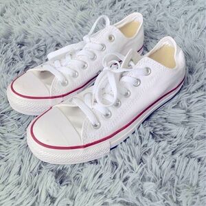Converse Chuck Taylor white shoes. Women’s size 7. Men’s size 5.
